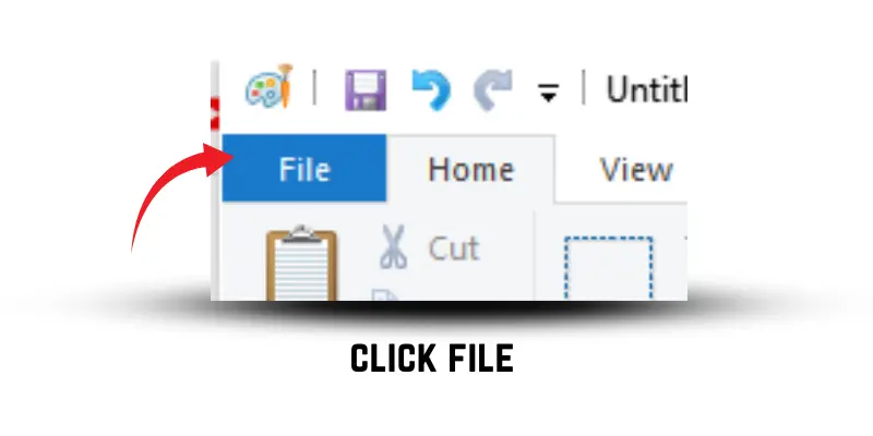 A computer screen showing an arrow pointing to the 'File' menu