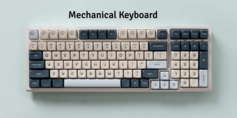 Top view of a mechanical keyboard with beige and blue keys, labeled as mechanical keyboard.