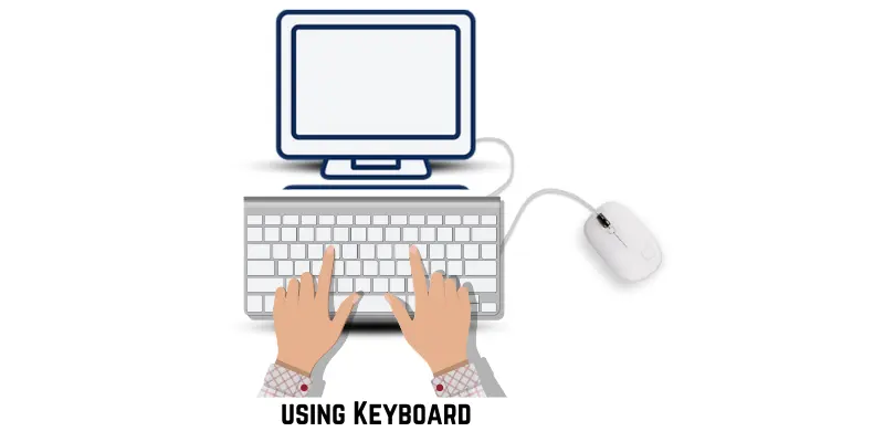 A person typing on a computer keyboard with both hands.